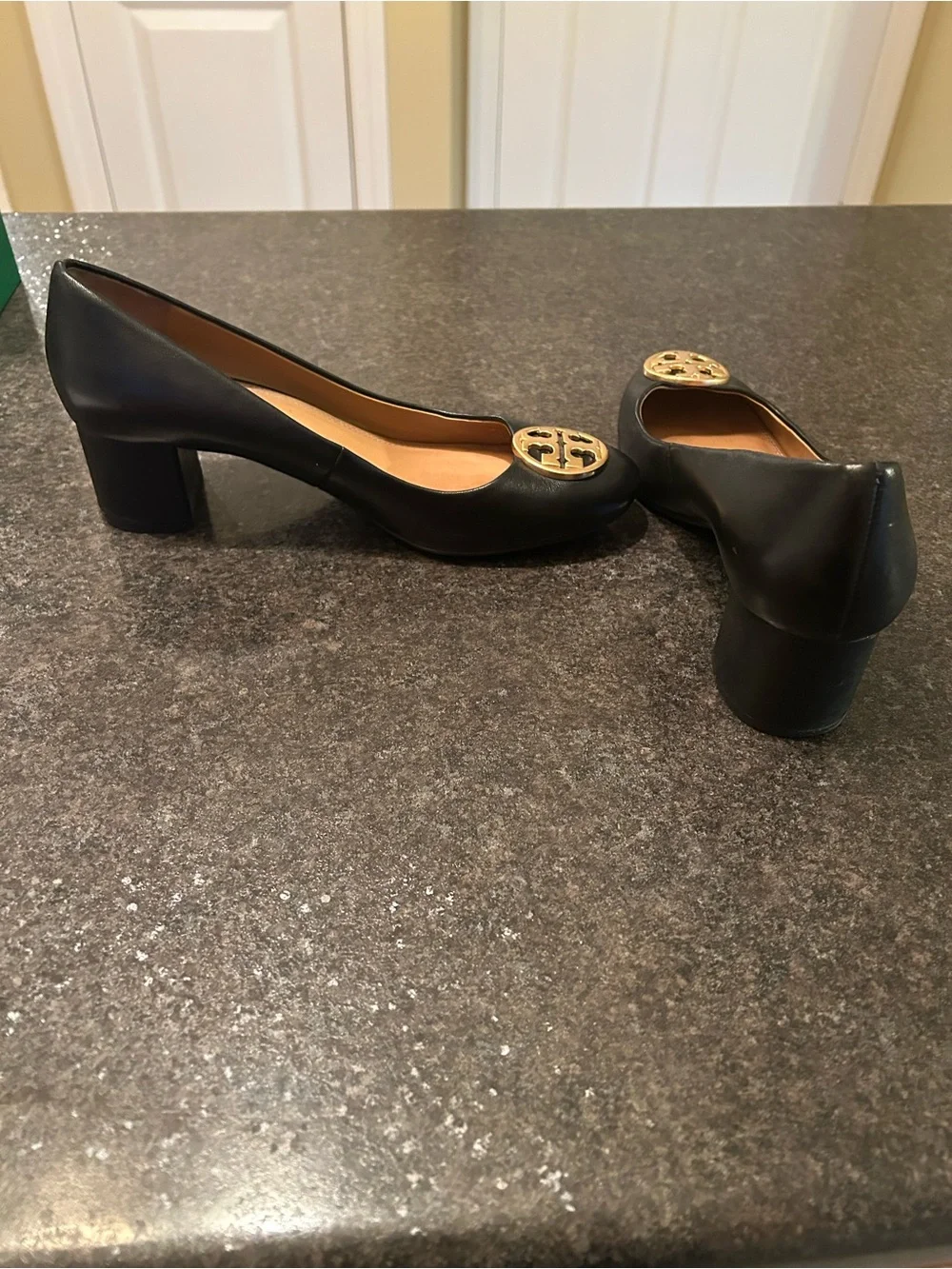 Tory Burch Black Leather Block Heel Pumps with Gold Logo Medallion